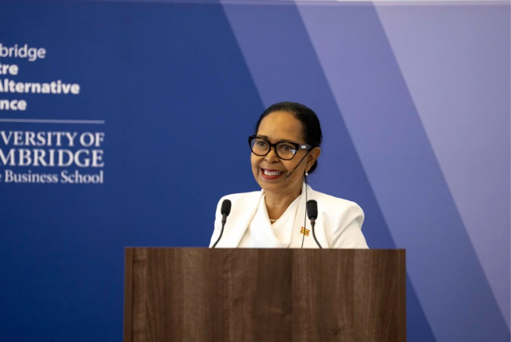 Shadel Nyack Compton of Belmont Estate, speaking at a podium